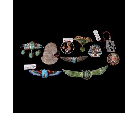 Fifteen vintage pseudo-Egyptian brooches and pins, two 45mm scarab beetle gilt metal brooches; an 8mm multi-coloured enamelle