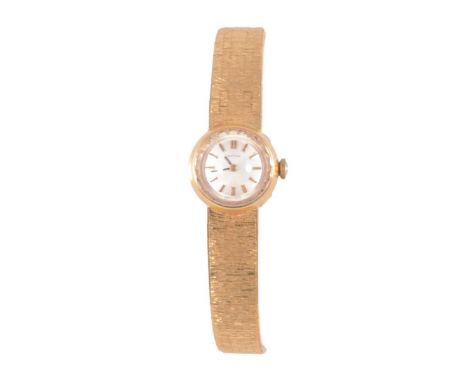 Certina – a lady’s yellow metal manual wind bracelet wristwatch, 11mm circular silvered dial with raised baton markers in a 1