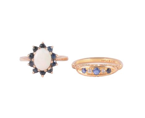 Two gemset rings, sapphire and diamond, opal and sapphire, a sapphire and diamond boat shape ring, the three brilliant cut sa