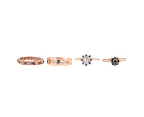 Four gold gemset rings, sapphire and diamond, sapphire, garnet and pearl, a sapphire and diamond reverse cluster ring, the br