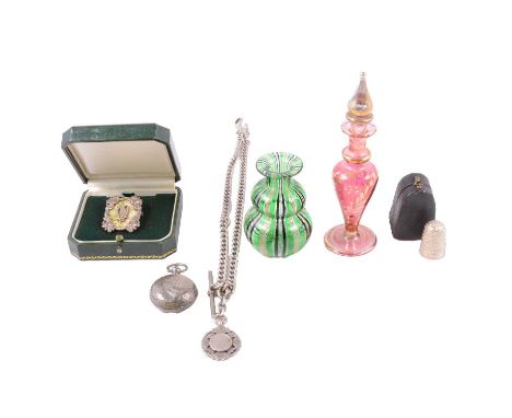 A small collection of silver and white metal jewellery, and glass scent bottles, an Irish Connemara marble and marcasite broo