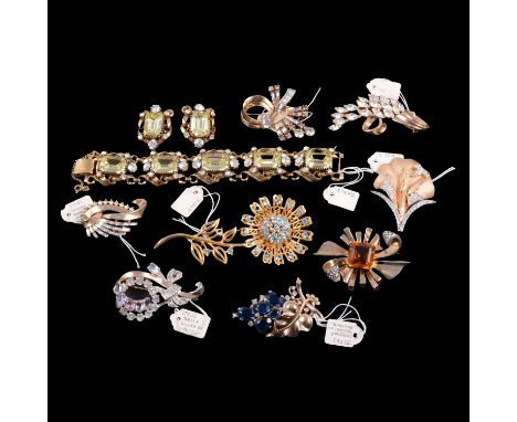 A collection of vintage jewellery including Trifar, Mazer and Florenza, a Crown Trifari stylised floral brooch with yellow me