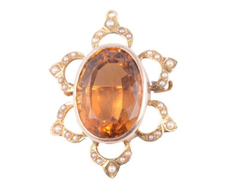A citrine and seed pearl brooch, and a garnet and opal ring, a citrine and seed pearl brooch, the oval mixed cut citrine, app
