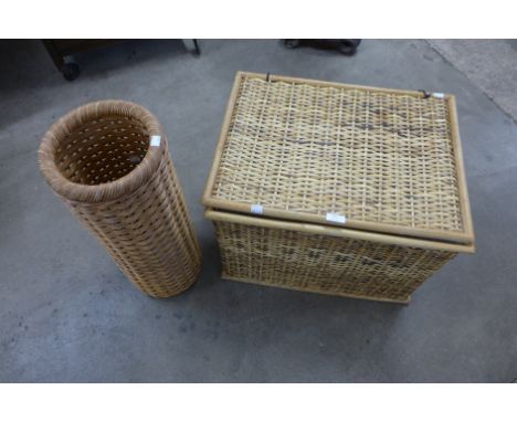 A wicker ottoman and a stick stand 