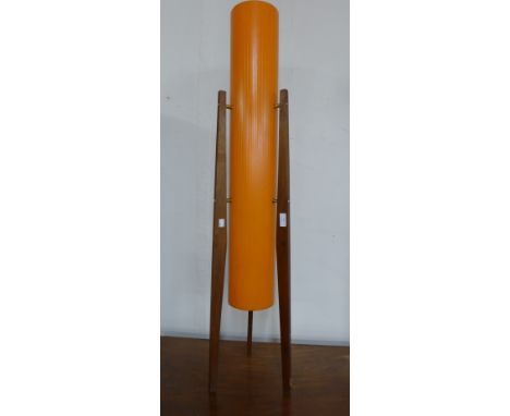 A teak floor standing rocket lamp 