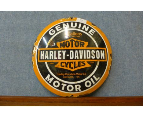 A circular enamelled Harley Davidson sign 