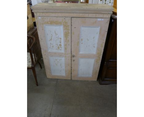 A Victorian painted pine two door kitchen cupboard 