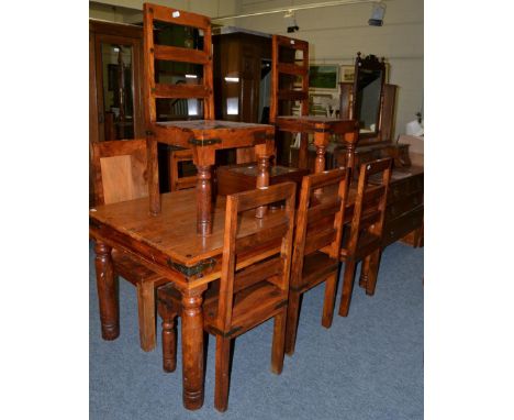 A quantity of household furniture including dining table, eight chairs, pine chest, dressing table, leather button back armch