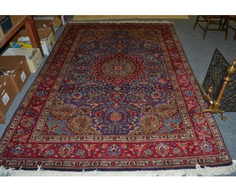 Tabriz Carpet, Iranian Azerbaijan, the steel blue floral field with central medallion framed by spandrels and meandering vine