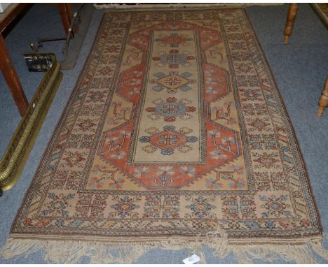 Melas carpet, West Anatolia, the corn field with rows of medallions enclosed by double borders, 260cm by 150cm