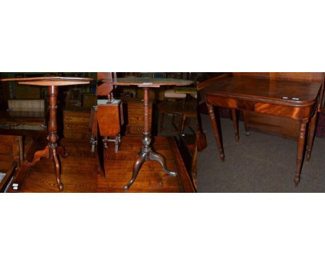 A mahogany oval top tripod table, 18th century in part; a Victorian mahogany tripod table and a late George III mahogany fold