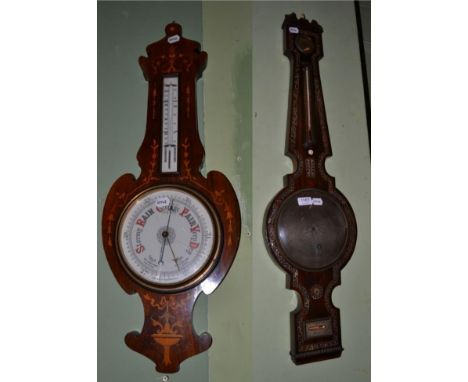 A 19th century rosewood and mother-of-pearl inlaid wheel barometer, by W.T.Ferrier of Hull, silvered dials, ivory finial; tog