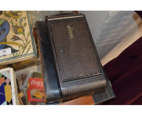 A large Kodak camera with carrying case 