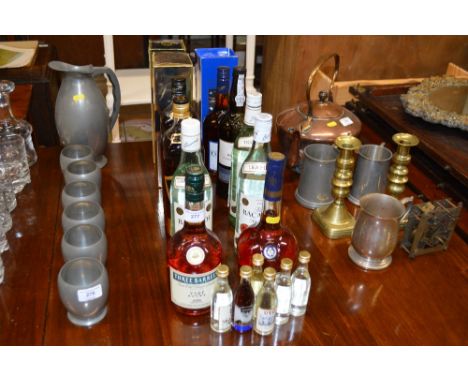 Two bottles of Johnnie Walker Black Label whisky, three bottles of Bacardi, a bottle of Courvoisier cognac etc.