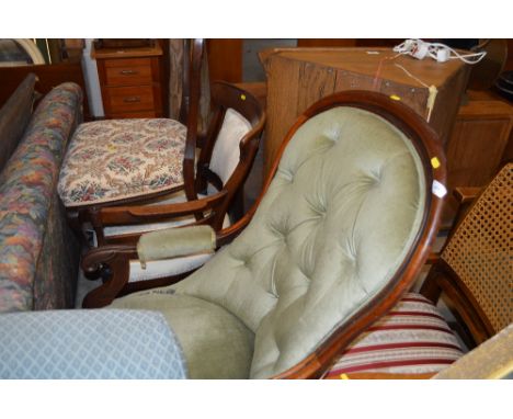 A Victorian mahogany green upholstered button back arm chair 