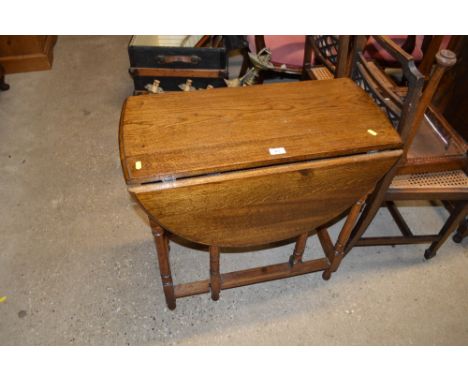 A 18th Century style oak gate leg table 