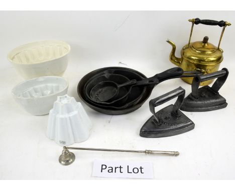 Collection of ceramic jelly moulds, cast iron ware including irons and pans, etc. 