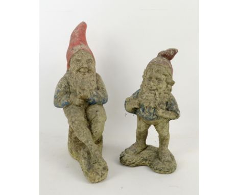 Two vintage reconstituted stone garden gnomes with original paint