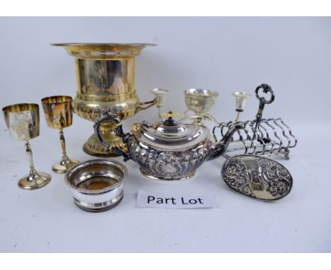 Group of silver plated items including a three piece tea-service, two cased dessert sets, selection of mixed flatware, two cl