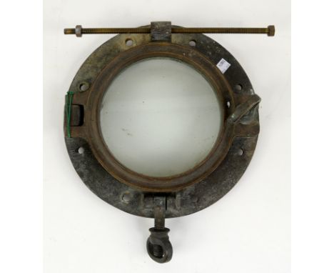 Vintage brass ships porthole with hinged glass, 29cm dia. and a glass display dome on wooden base. 19cm dia 36cm high
