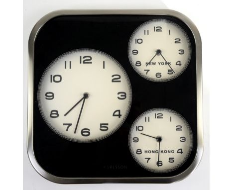 A Karlsson quartz wall clock with subsidiary dials for New York and Hong Kong time, a chrome cased nautical-style quartz wall