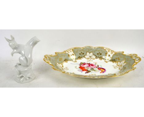 Meissen blanc de chine figure of a squirrel modelled by Alexander Struck, 19th century cake plate hand painted with a floral 