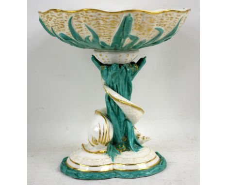 Royal Worcester dolphin comport, in cream and green, decorated with shells and bulrushes