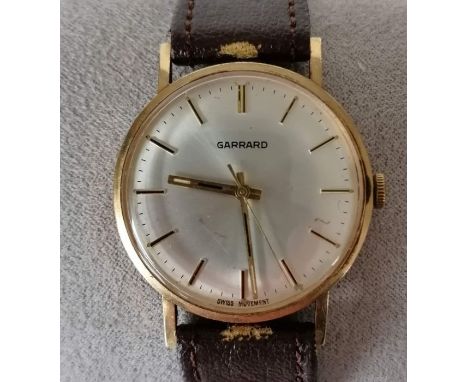 A Garrard manual wristwatch with champagne dial, 28mm, raised baton markers, sweeping seconds hand on a later strap, original