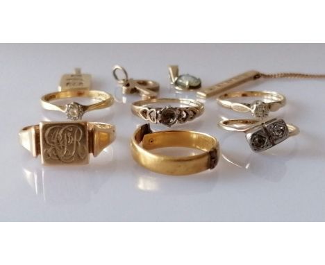 A 22ct yellow gold wedding band, cut, 3.85g; a signet ring, initialled and a two-stone illusion set ring, both 18ct gold, 7.5