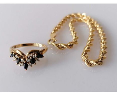 A yellow gold rope-twist bracelet by Graser, 22 cm, stamped 750, 4.75g; a gem-set 9ct gold ring, size Q, hallmarked, 3g (2)