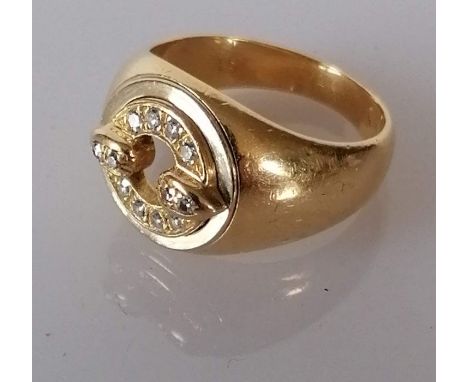 A diamond and yellow gold signet ring with tapering, shank bearing a Cartier signature, the twelve brilliant-cut diamonds tot