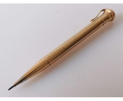 A George V 9ct gold pencil with engine turned design by Wahl Eversharp &amp; Co., London, 1937, 10cm, initialled, 16.75g
