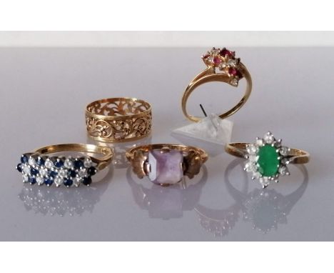 A mid-century-style diamond and ruby cluster ring on a split-shoulder 18ct yellow gold setting, 3.5g; a pierced 14ct yellow g