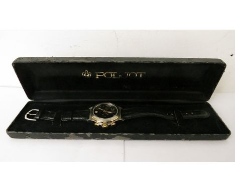 A Poljot Soviet commemorative watch, no 4 circa 1996.  A chronographic watch with day indication, titanium case, black dial w