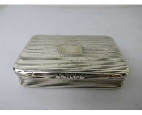 A Georgian silver snuff box with reeded design, makers mark, Birmingham JW