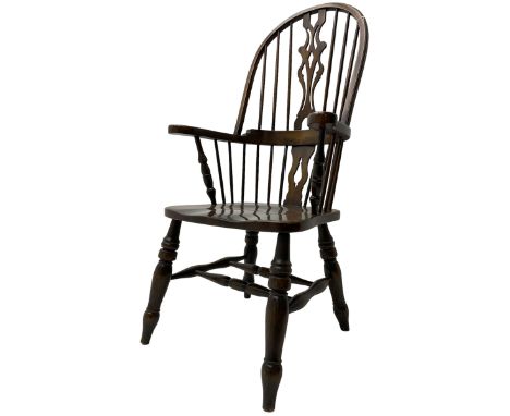 Stained beech Windsor armchair, double hoop and stick back with shaped and pieced splat back, on turned supports united by do