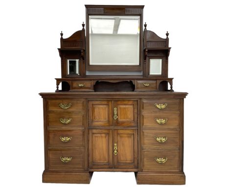 Edwardian mahogany dressing chest, raised triple mirror back with bevelled plates and fluted decoration over two trinket draw