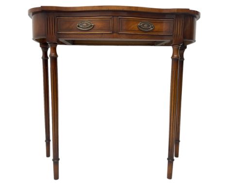 Regency design mahogany serpentine console table, fitted with single drawer disguised as two with cockbeaded facia, raised on
