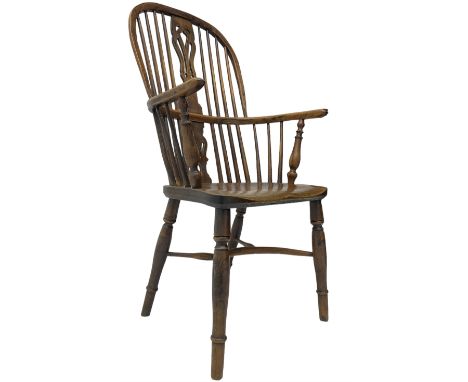 19th century yew wood and elm Windsor chair, high hoop and stick back with pierced splat over dished seat, raised on ring tur