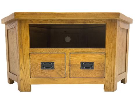 Oak corner television stand, hexagonal top over recessed shelf, fitted with two drawers to baseDimensions: Height:&nbsp;56cm&