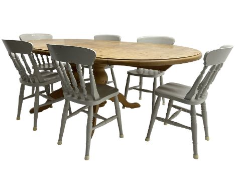 20th century pine extending dining table, oval top over twin bulbous turned pedestal base united by stretcher, with additiona
