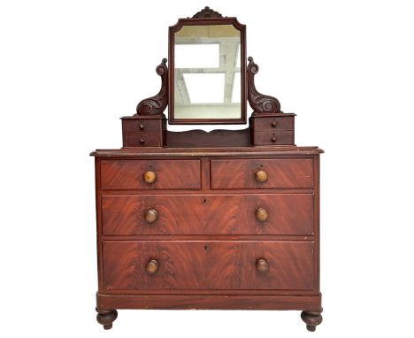 Victorian scumbled pine dressing chest, raised swing mirror in moulded frame with scrolled carved pediment, foliage S-scroll 