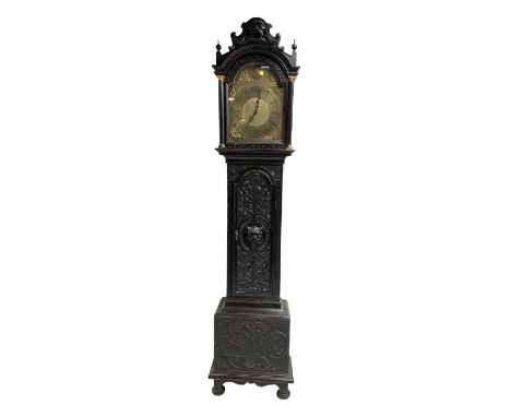 Victorian Jacobean revival oak cased 30 hour longcase clock - with a carved pediment and break arch door beneath, door with a