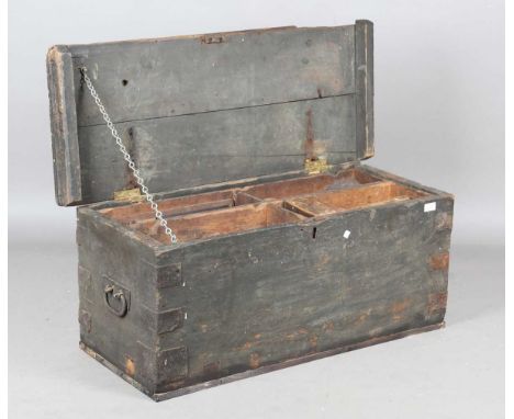 A 20th century pine toolbox, containing a selection of carpentry tools, including chisels, gauges and planes.