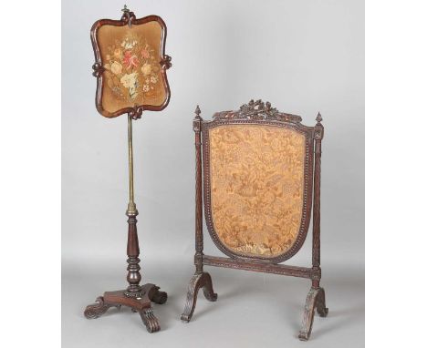 A late 19th/early 20th century French Neoclassical Revival walnut firescreen with a carved frame and silk needlework panel, h