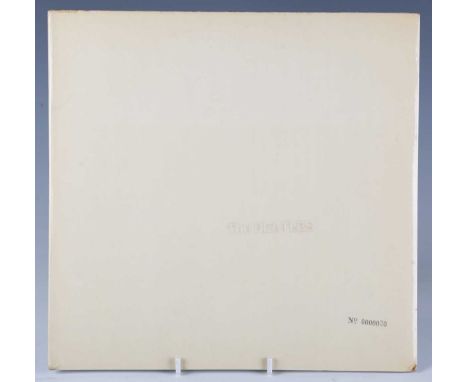 A double LP record, The Beatles self-titled 'White Album', early Sleeve No. 0000030, embossed front cover, top loading, black