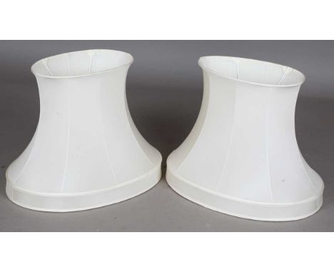 A pair of modern cream silk lamp shades, height 41cm, width 52cm.