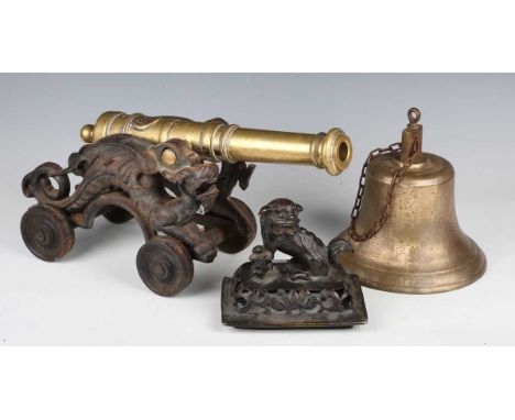 A 20th century brass and cast iron model of a cannon, length 45cm, together with a brass bell and a Chinese bronze censer lid