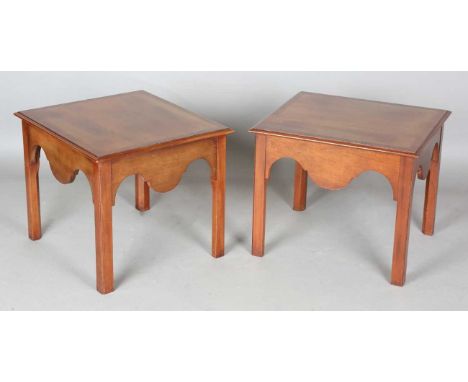 A pair of 20th century mahogany rectangular lamp tables, each with a crossbanded top and shaped apron, height 48cm, length 58