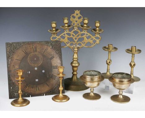 A group of mainly 19th century brassware, including a four-light candelabrum, height 47cm, a pair of Gothic Revival brass can